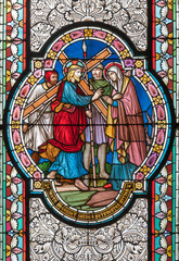 VIENNA, AUSTIRA - OCTOBER 22, 2020: The  Jesus meet his Mother Mary scene on the stained glass in ...