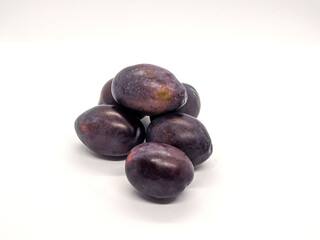 plums. plums on a white background side view