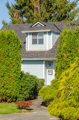 Fototapeta na wymiar Fragment of a nice house with gorgeous outdoor landscape in Vancouver, Canada.