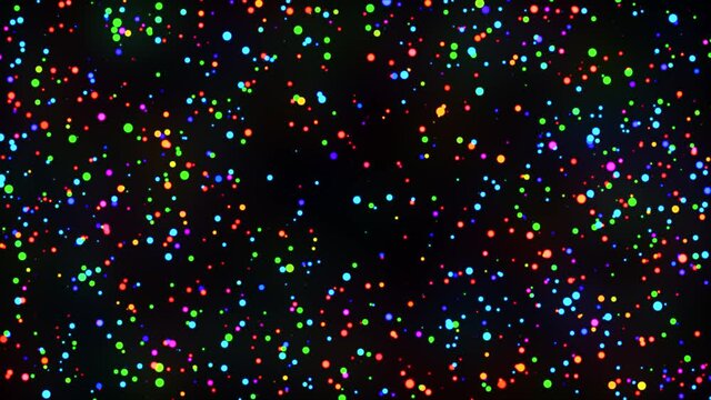 Colorful particles shining in rainbow colors. 4K loop playback compatible material
