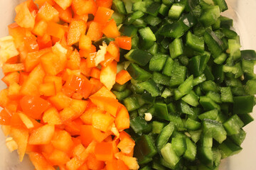 Sliced green and red peppers