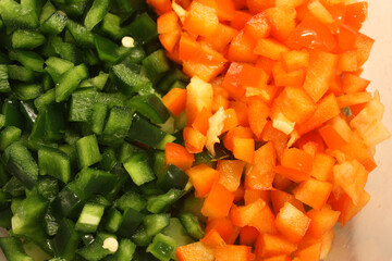 Sliced green and red peppers