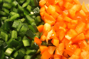Sliced green and red peppers