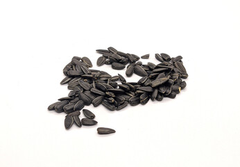 fried seeds. fried sunflower seeds on a white background side view