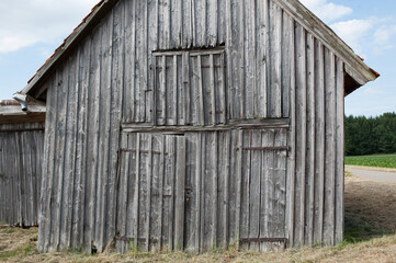 old wooden barn in the field