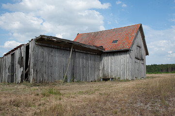 old wooden barn in the field