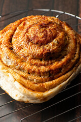 Large savoury scroll with melted cheese and Vegemite