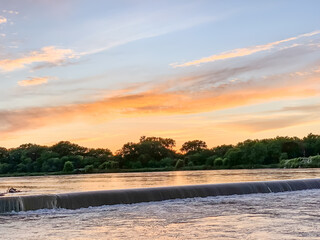 Orange and Blue Sunset over Nebraska Loup river . High quality photo