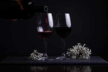 Red wine and two glasses for a romantic date night