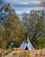 Teepee amongst the trees near the Avon river