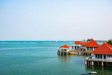 The image of the sea in the morning, the blue sea with the soft sunlight and the beautiful sky protruding. 