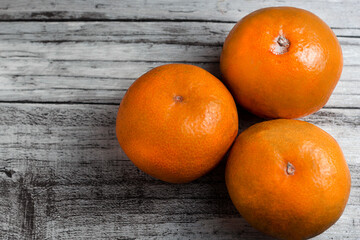 oranges on wooden table