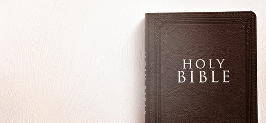 Holy Bible on a Textured White Surface