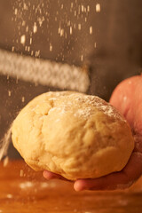 cook kneads his preparation before baking