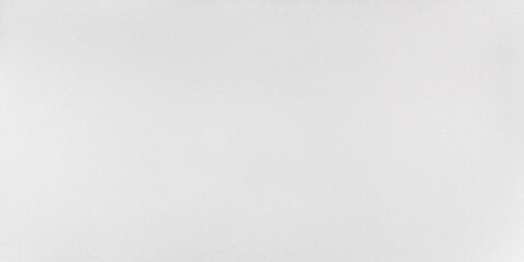 A soft white quartz with small warm toned flecks