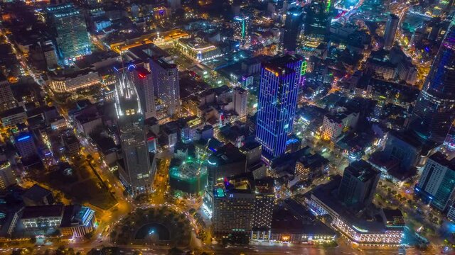 night time illuminated flight over ho chi minh city traffic bay aerial panorama 4k vietnam