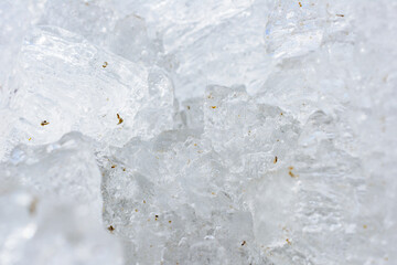 Unusual shapes and textures of ice crystals close-up shallow dof with copy space.