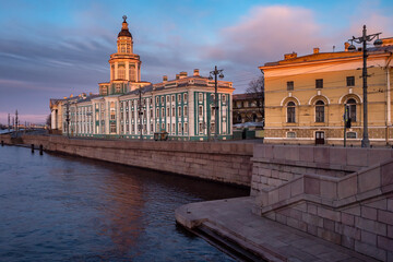 Fototapeta premium Kuntskamera in Saint Petersburg. Summer day in Russia. Kuntskamera on blue sky background. City landscape of Saint Petersburg. Travel across Russia. Tour in St. Petersburg. Museums of Russian cities