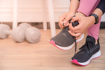 Young Asian muslim woman preparing for workout