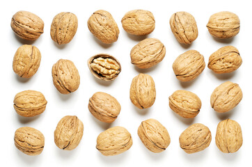 Walnuts on a white background. Nut - a source of vitamins and useful trace elements. Flat top view.