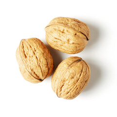 Walnuts on a white background. Nut - a source of vitamins and useful trace elements