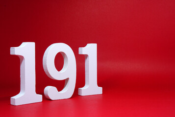 Number One nine One ( 191 ) on Red Background with Copy Space - Police emergency call number Concept