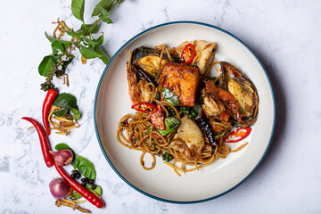 Spaghetti stir-fried in a plate
