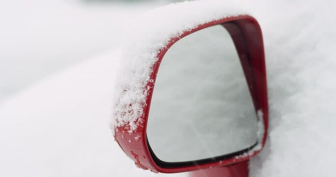 Snow Accumulating On Automobile Mirror