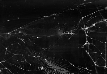 Fractured background. Broken glass texture. Black shattered aged faded window with dust scratches...
