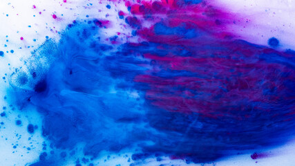 Paint splatter. Colorful background. Handmade art design. Bright fluorescent blue magenta pink dry ink pigment abstract spots strokes on dirty white grain texture.