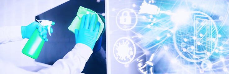 House cleaning concept. Wipe dust off surfaces. Disinfectant treatment of door handles TV...
