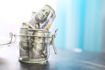 Group of money stack of 100 US dollars banknotes a lot of the background texture. Cash money in a large pile as a finance background.