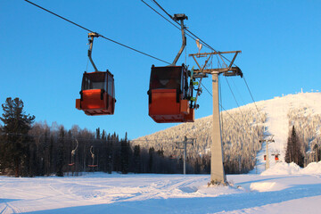Orange lift ski on the ski slope
