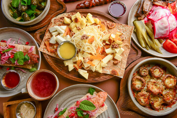 Assortment of georgian food, flat lay. Top view on traditional georgian cuisine close up.