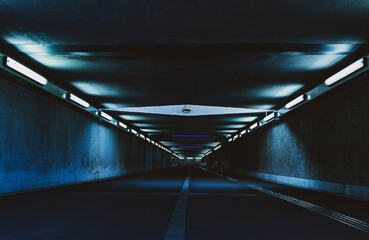 modern architecture of tunnel in the city with dark futuristic lighting