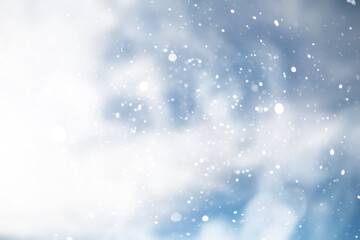 blue snowfall bokeh background, abstract snowflake background on blurred abstract blue