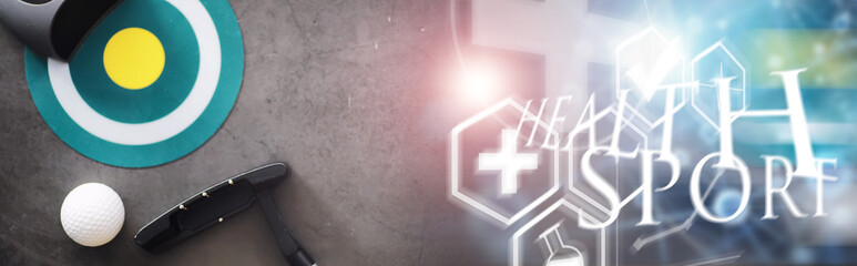 Sport and healthy lifestyle. Mini golf. White golf ball and set for minigolf on the table. Sports background with golf concept.