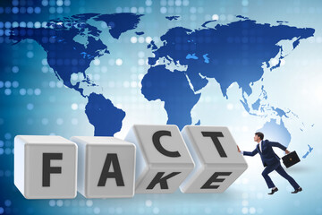 Face or fact concept with turning cubes