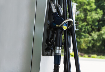 Gas station pump fuel nozzles.