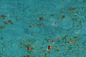 Texture of old turquoise paint on metal