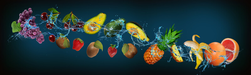 Fototapeta na wymiar Panorama with fruits in water - grapefruit, strawberry, kiwi, avocado, banana, pineapple - a balance of health and pleasure for people
