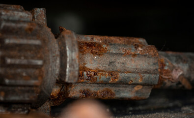 Old rusty car parts close up