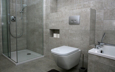 A modern bathroom in gray colors in a simple style 