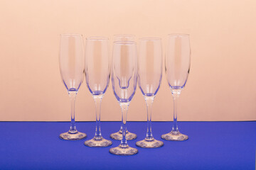 Set of luxury champagne glasses in a shape triangle.