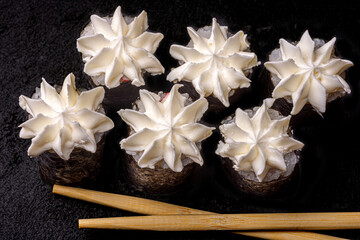 sushi with chopsticks