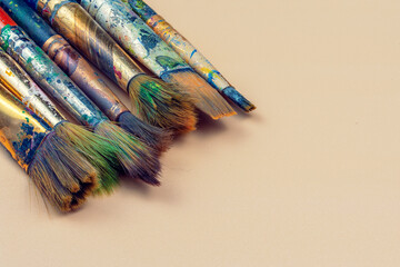 Art brushes in paint close-up
