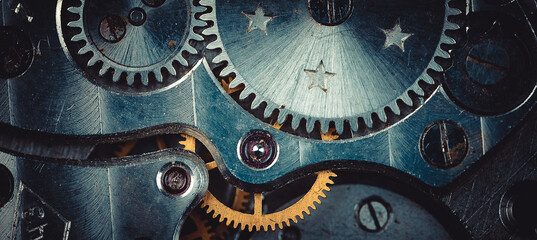 Vintage watch movement close - up. Selective focus on elements, macro photography. Background in...