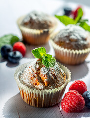 muffins with berries and mint