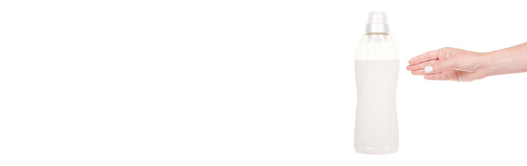 Hand with laundry detergent in bottle, isolated on white background.