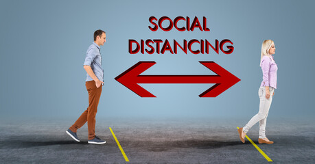 People walking next to SOCIAL DISTANCING phrase. Coronavirus COVID-19